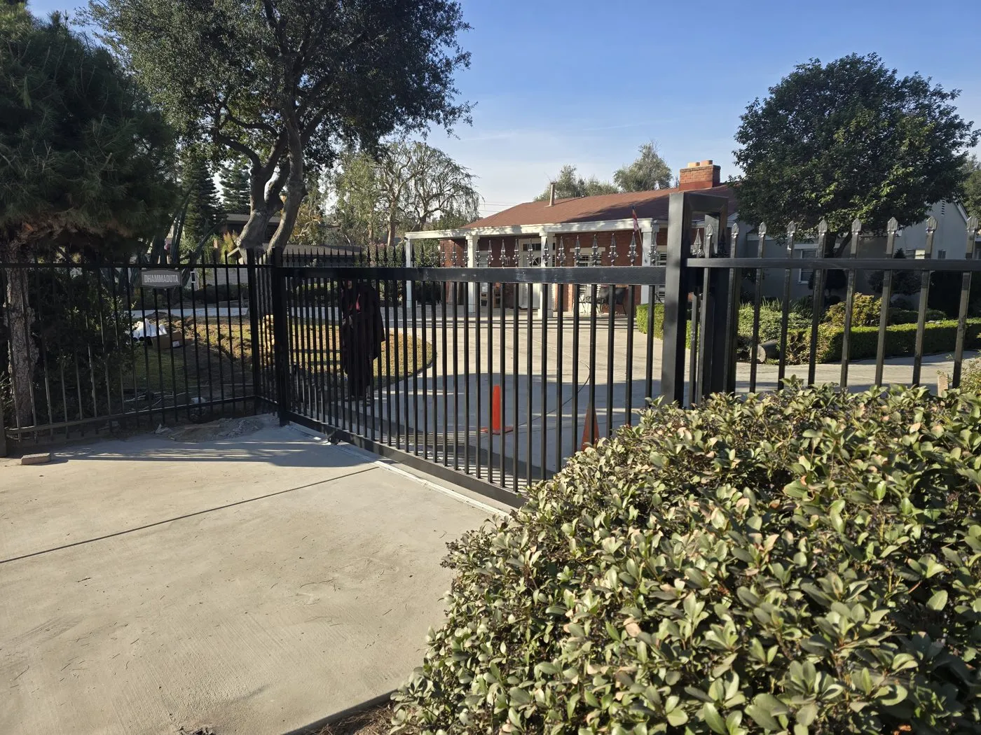 Iron driveway gate installation