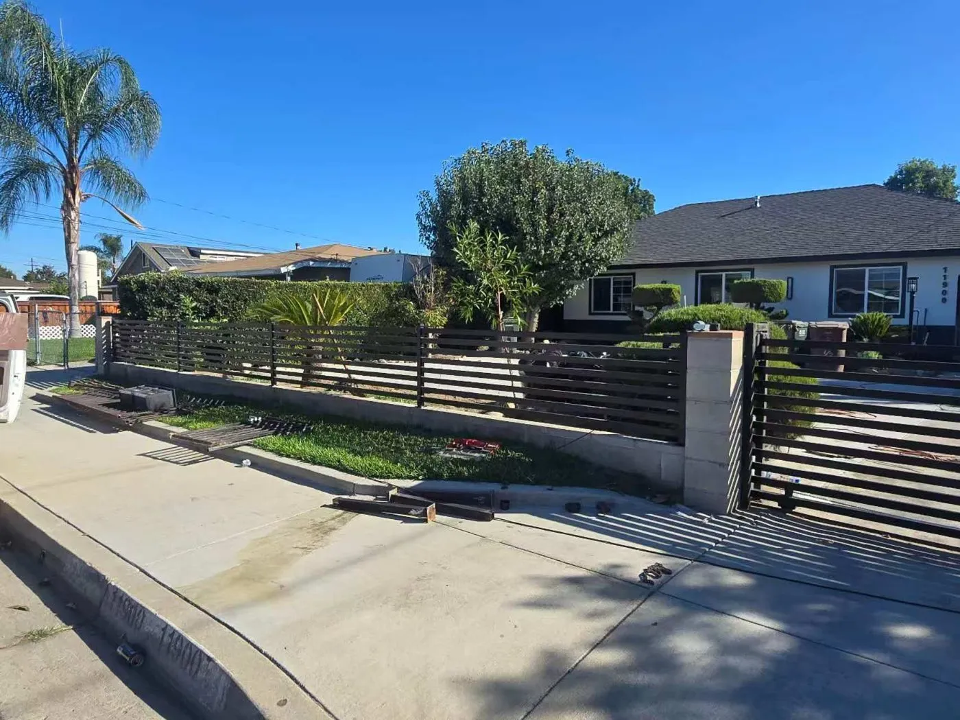 Wrought iron fence with brick pillars in La Puente