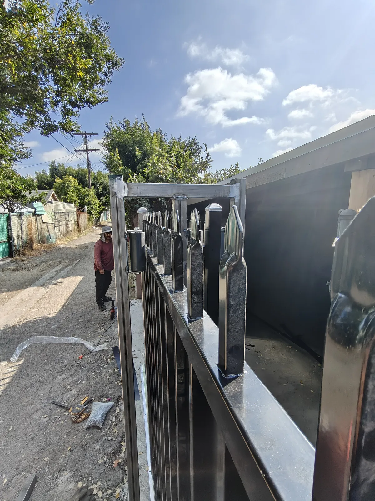 Galvanized steel sliding gate with spear-top pickets, Los Angeles