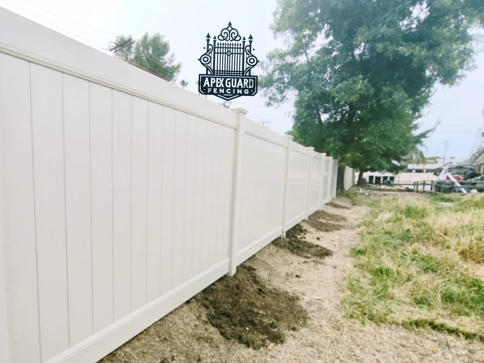 Tall solid white vinyl privacy panels installed by Apexguard Fence in Rowland Heights, CA