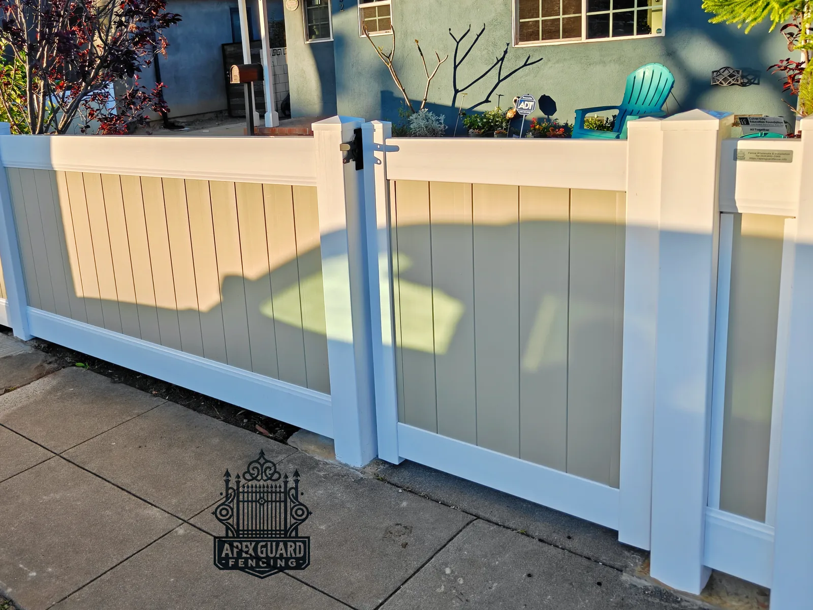 Two-tone vinyl fence with lattice top installed by Apexguard Fence in Rowland Heights, CA