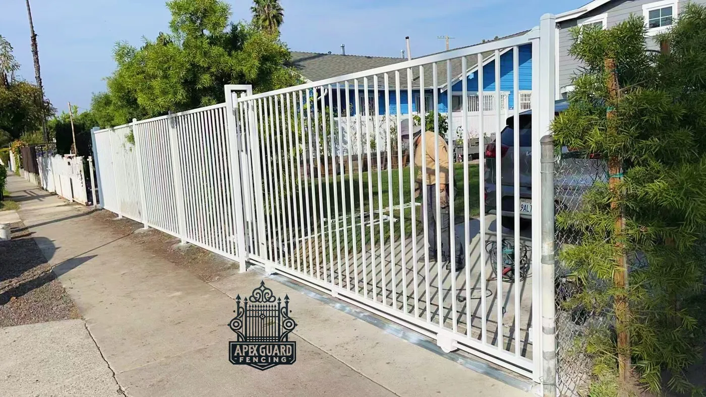 White vinyl fence around a yard