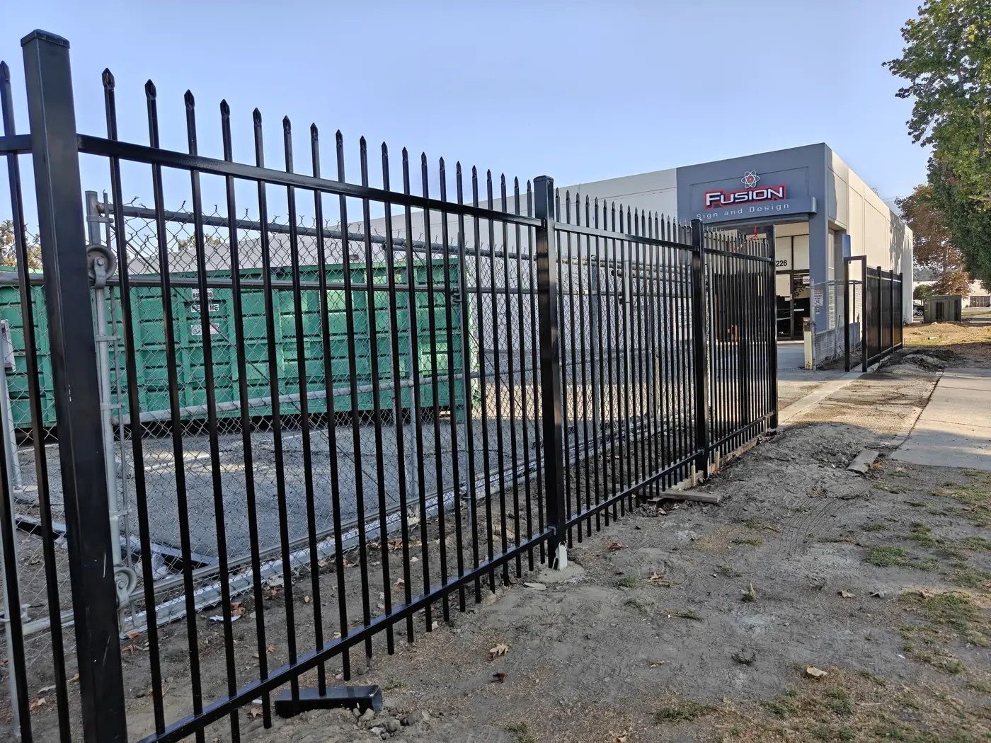 7 ft commercial spike fence along the Fusion Sign and Design building frontage in Whittier, CA