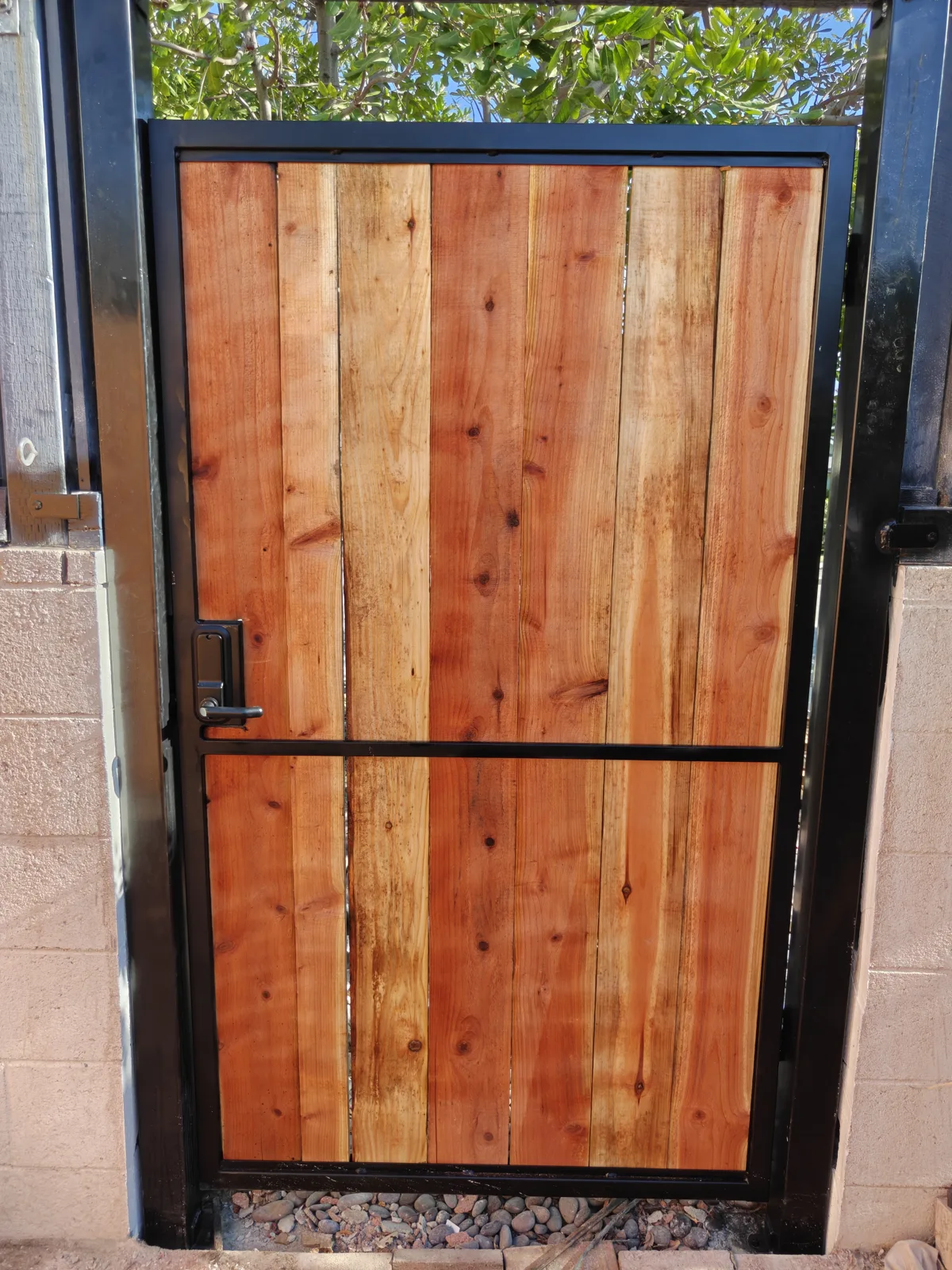 Steel-frame redwood gate with keyless keypad lock, straight-on view — Apexguard Fence project in Claremont, CA